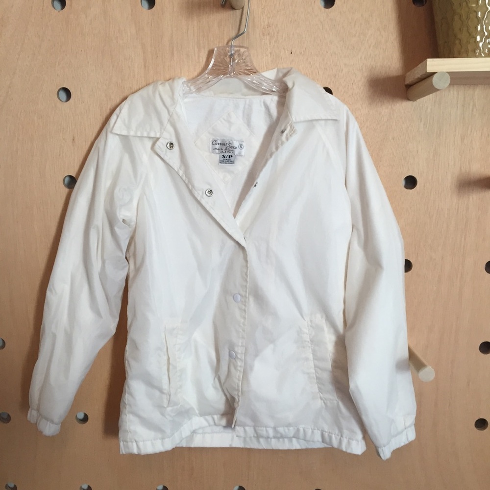 White windbreaker